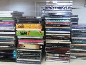 Photo of CDs, stacked and ready for transferring